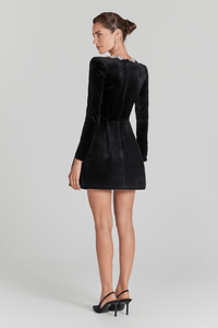 Back view of a black velvet Christmas mini dress with long sleeves and jeweled neckline, elegant holiday party outfit.